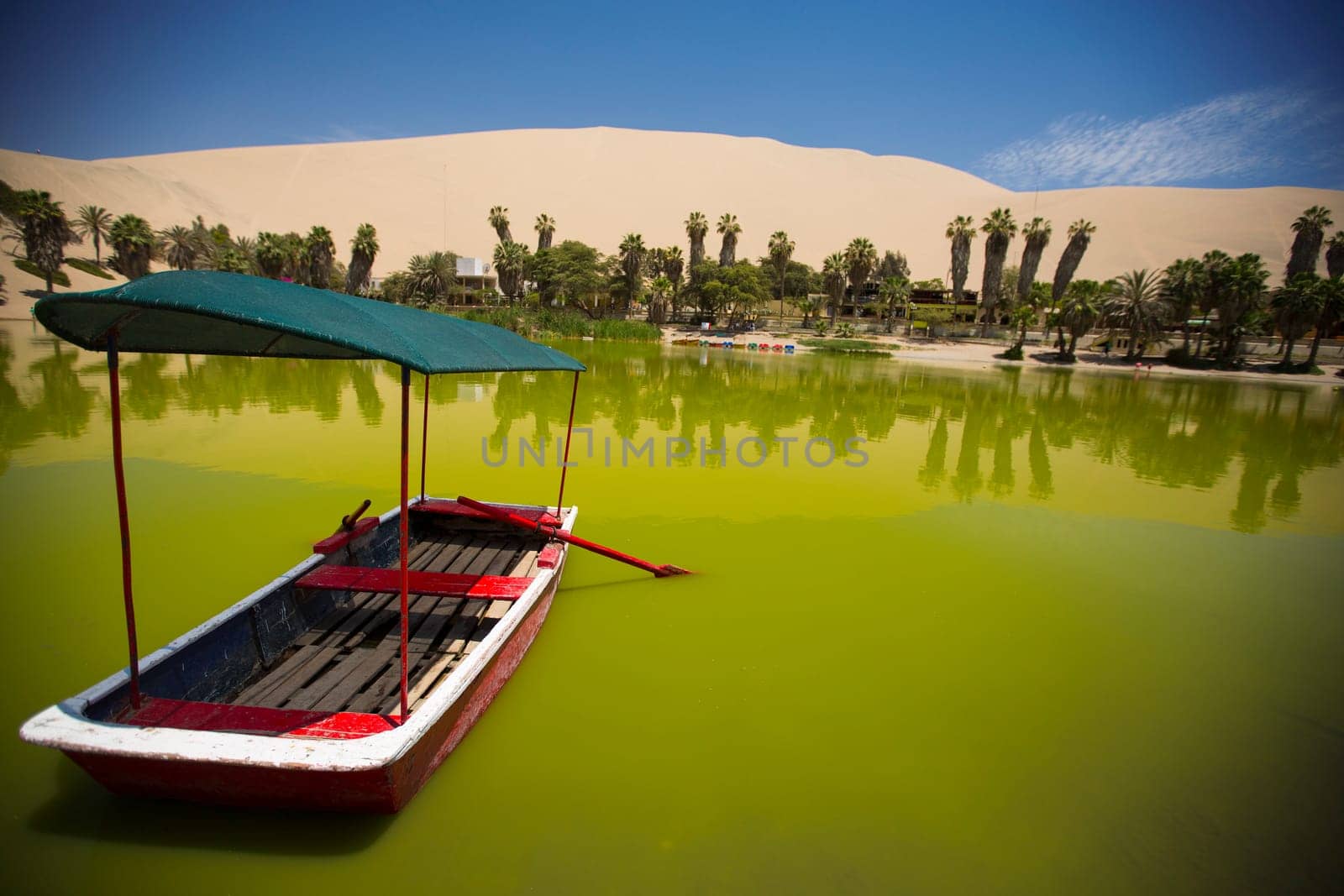Oasis surrounded by sand dunes near Ica Peru