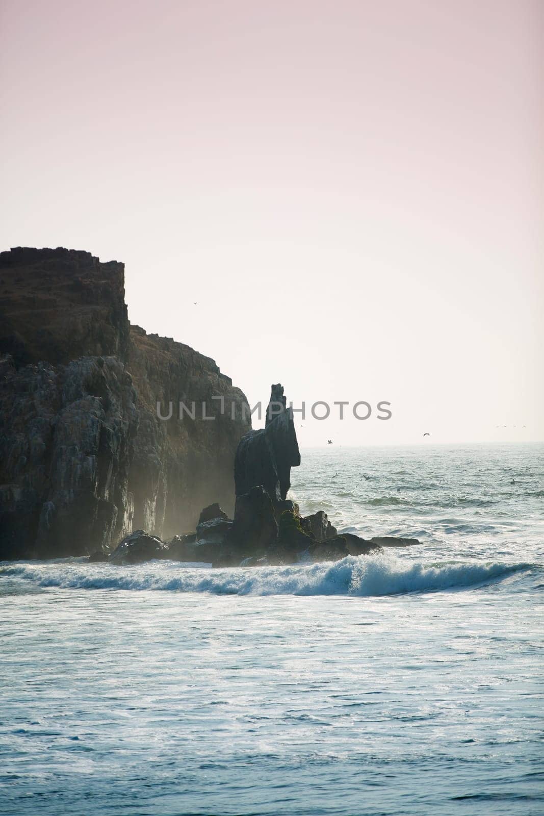 rocky coast along the ocean. Peru