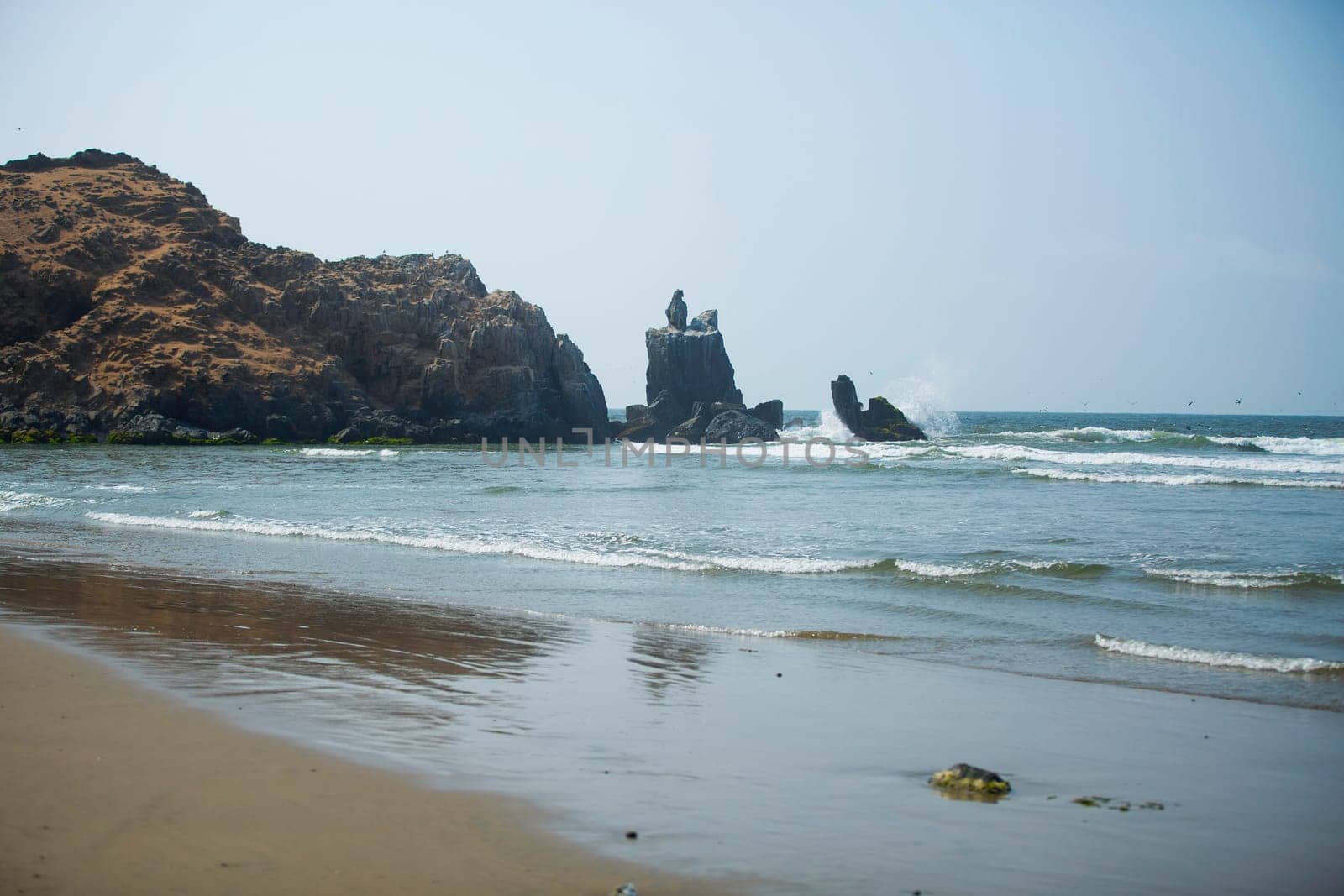 rocky coast along the ocean. Peru