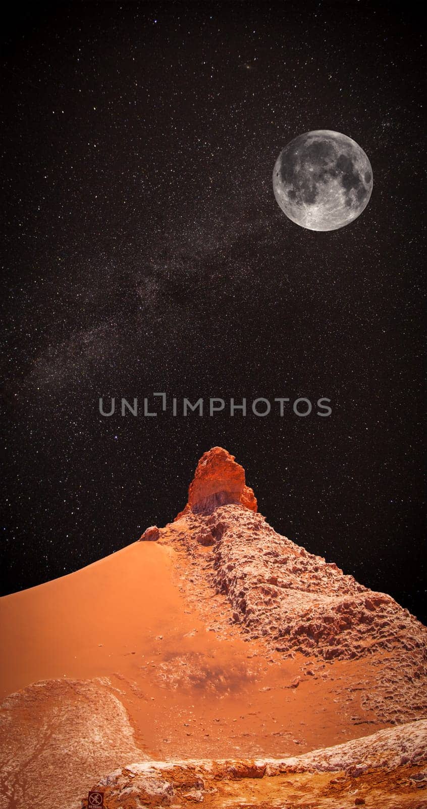 At night, under the light of stars. Valle de la Luna (Moon Valley) close to San Pedro de Atacama, Chile