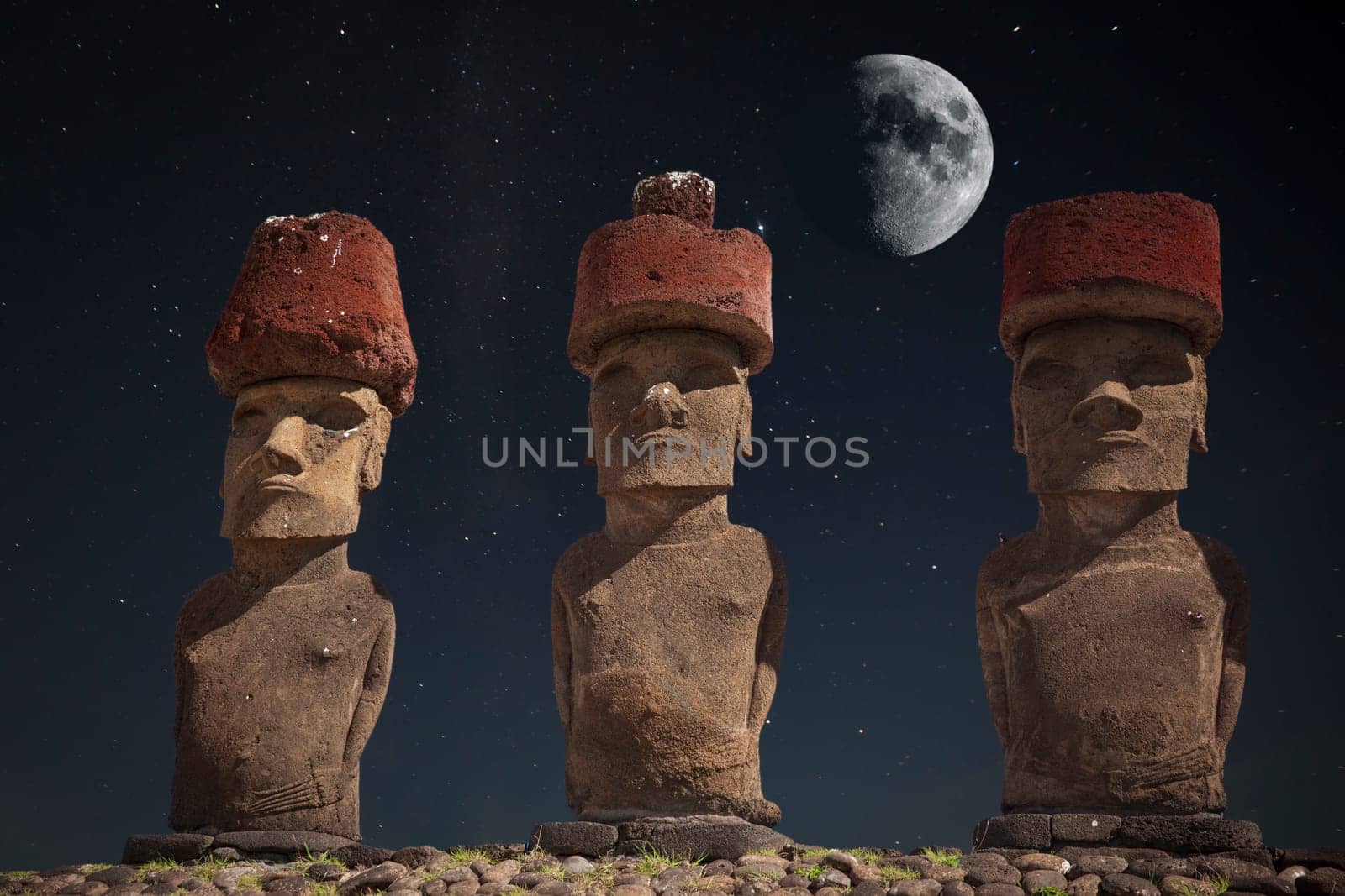 At night, under the light of stars. Moais at Ahu Tongariki (Easter island, Chile)