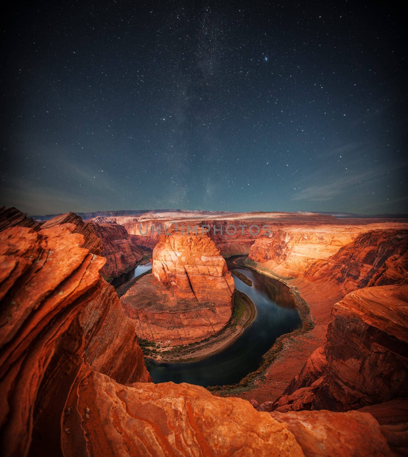 Grand Canyon at night under the light of the stars in the sky