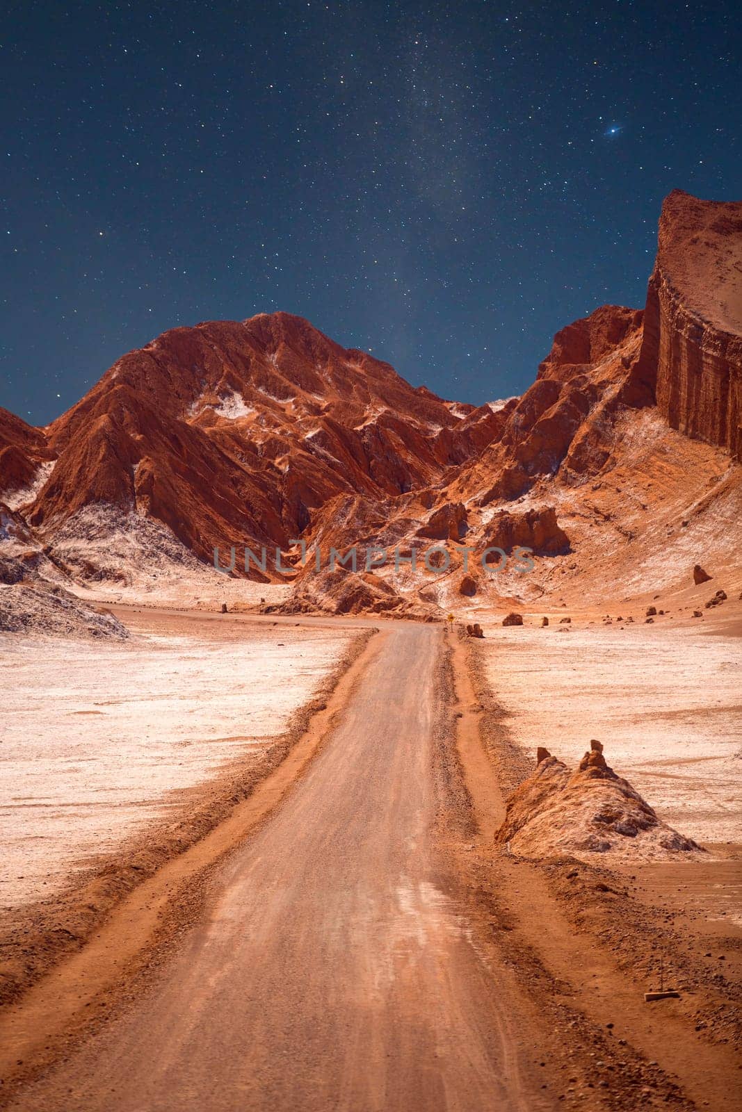 night sky. Amphitheatre is beautiful geological formation of Moon Valley in Atacama Desert, Chile