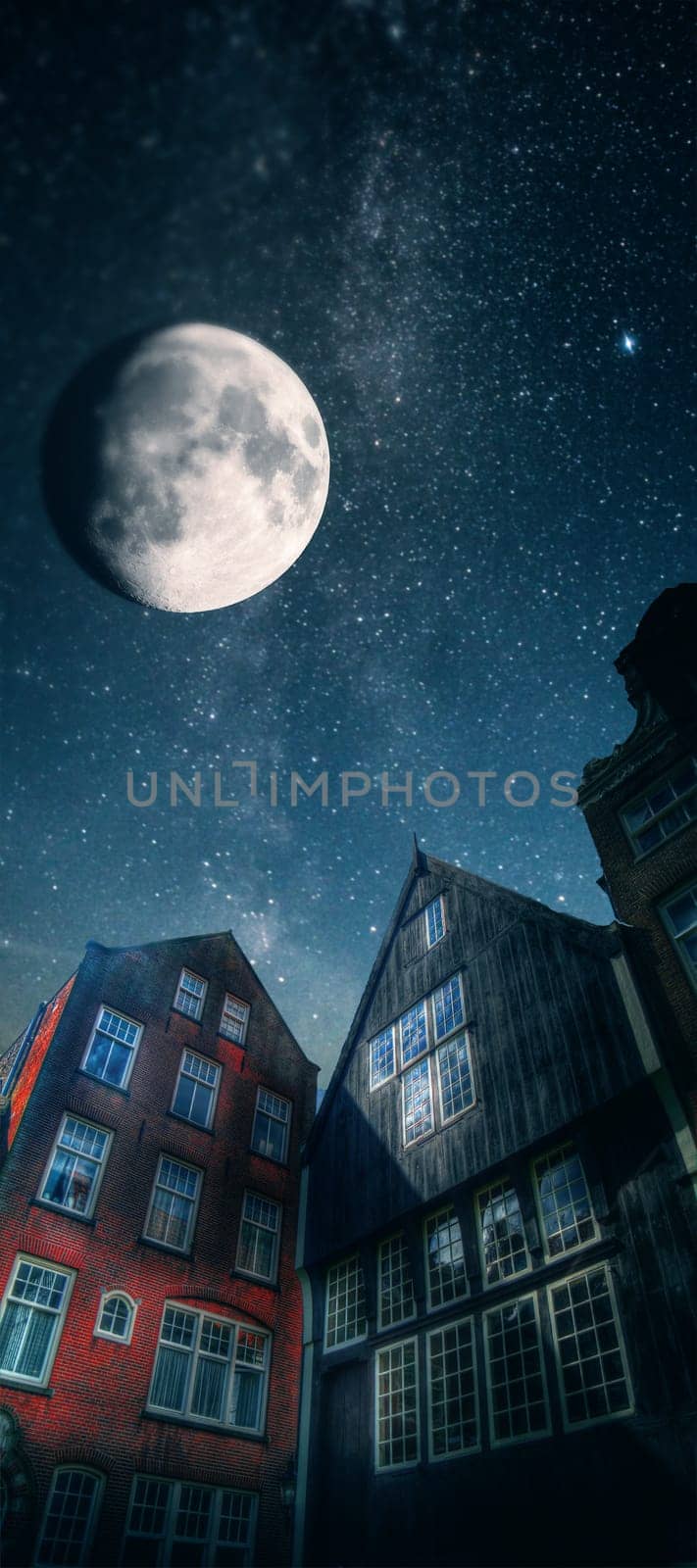At night, under the light of stars. courtyard of Amsterdam. historical monument begijnhof