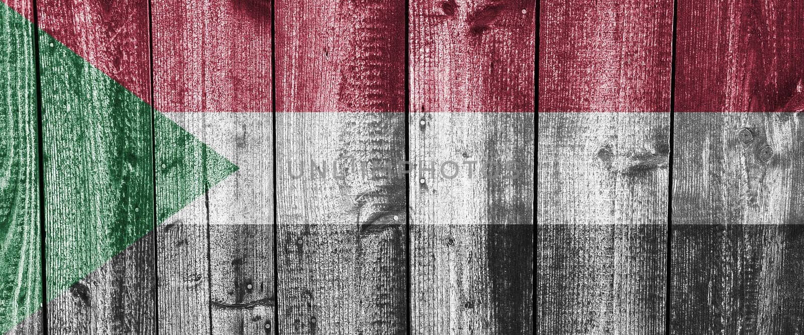 Flag of Sudan on weathered wood