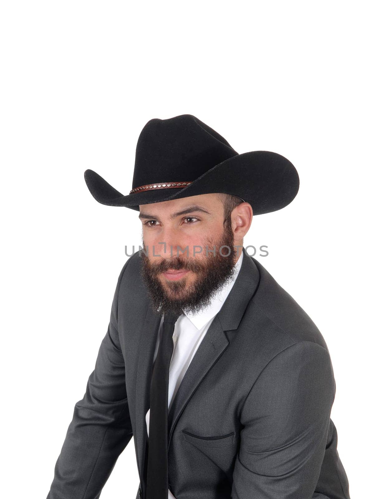 A close up portrait image of a handsome man in a suit and cowboy hat.with a beard and mustache, isolated for white background.