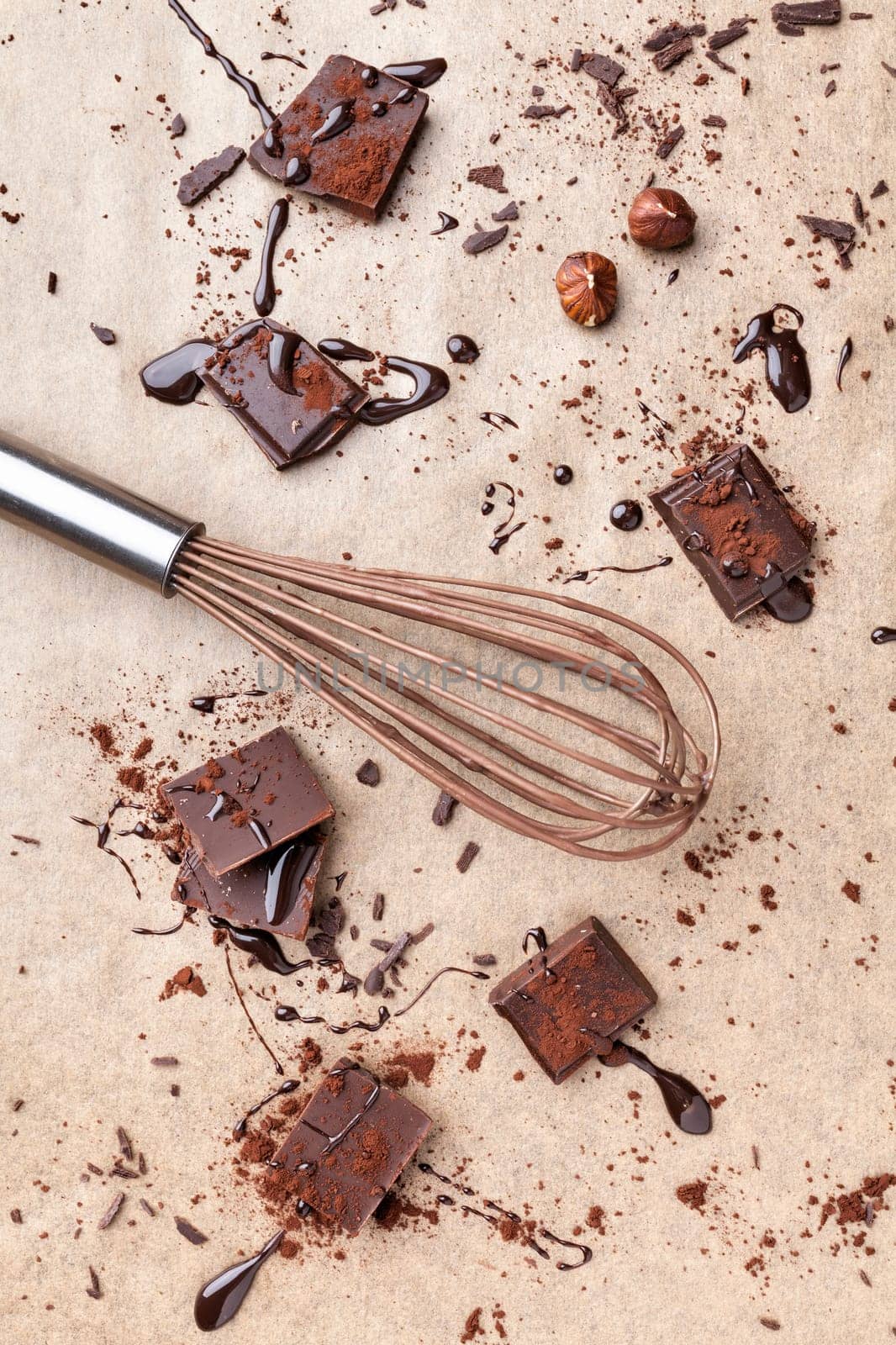 Delicious dark chocolate pieces with cocoa powder