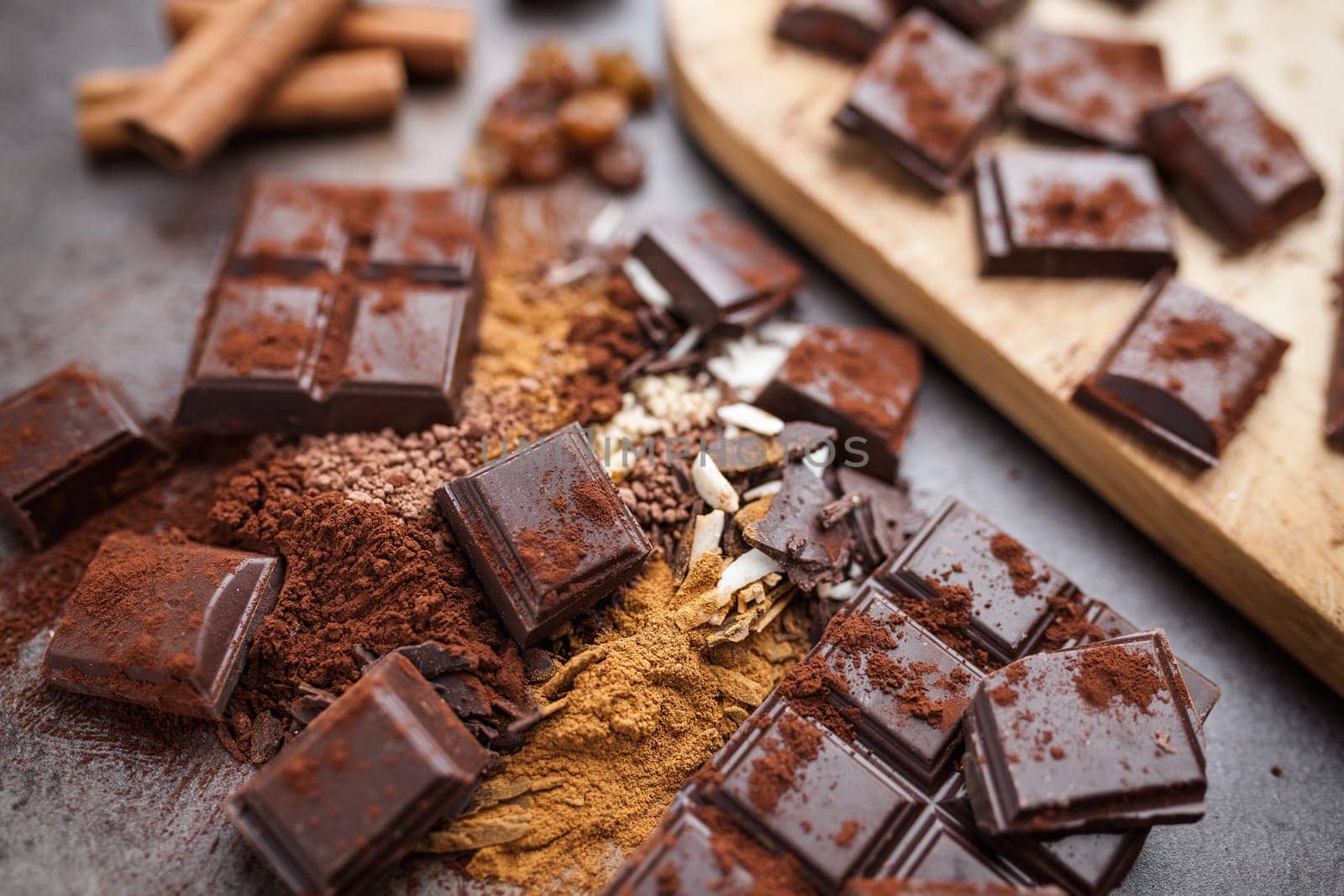 Delicious chocolate on a rustic grey background