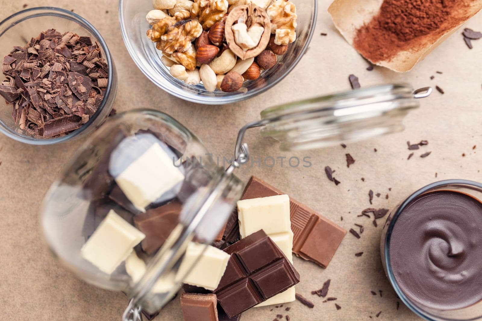 Variety of delicious chocolate bars in a jar