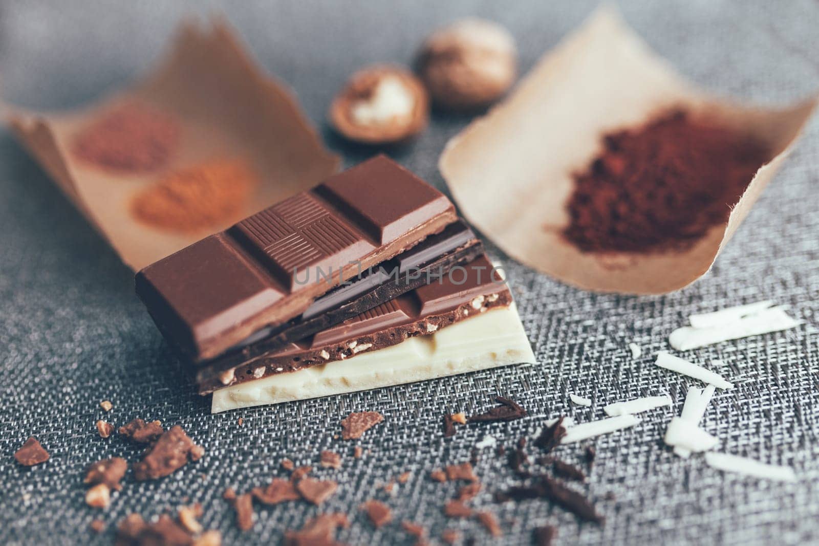 Delicious chocolate on a rustic grey background