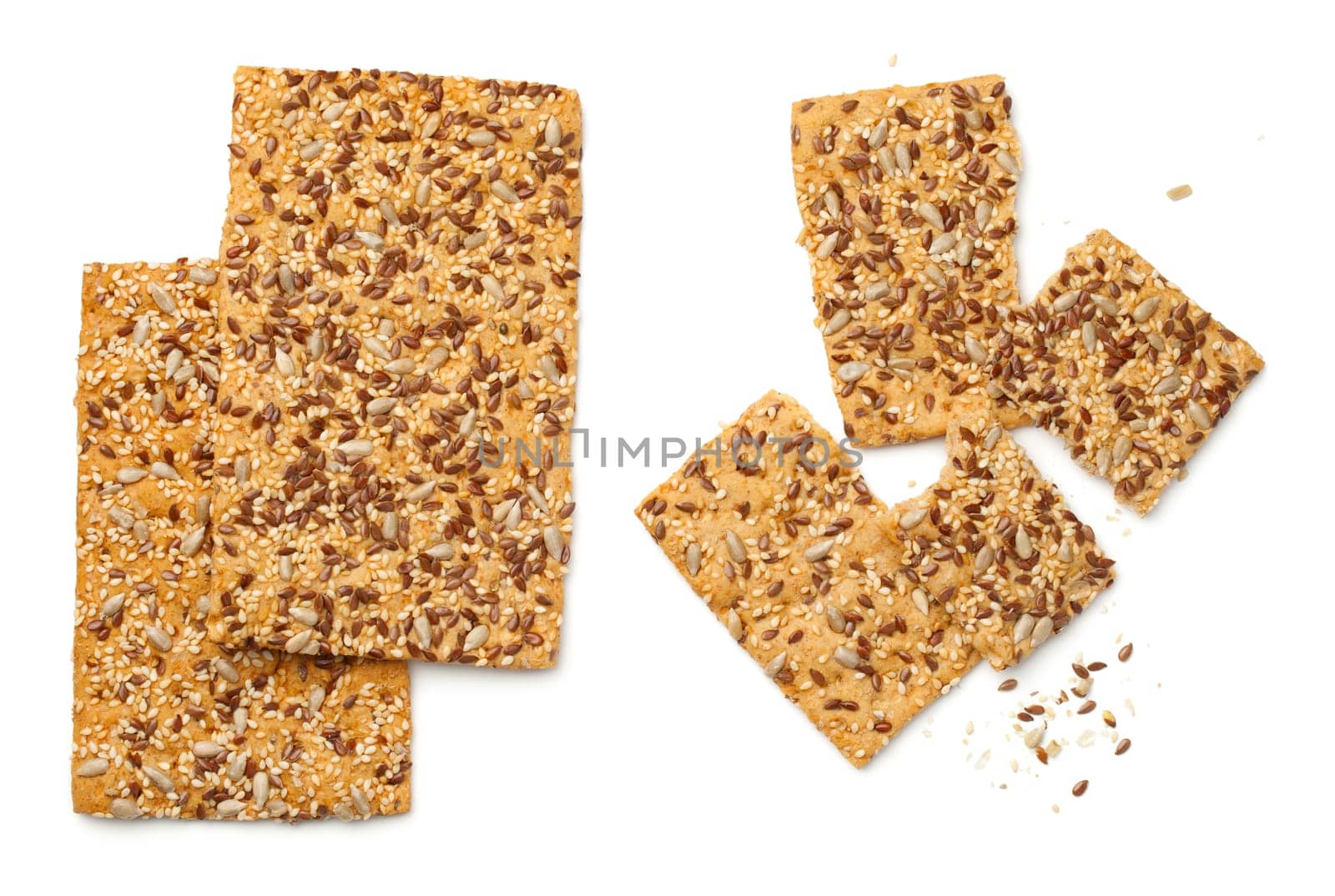 crisp bread with linseed,sesame and sunflower seed isolated on white background. top view