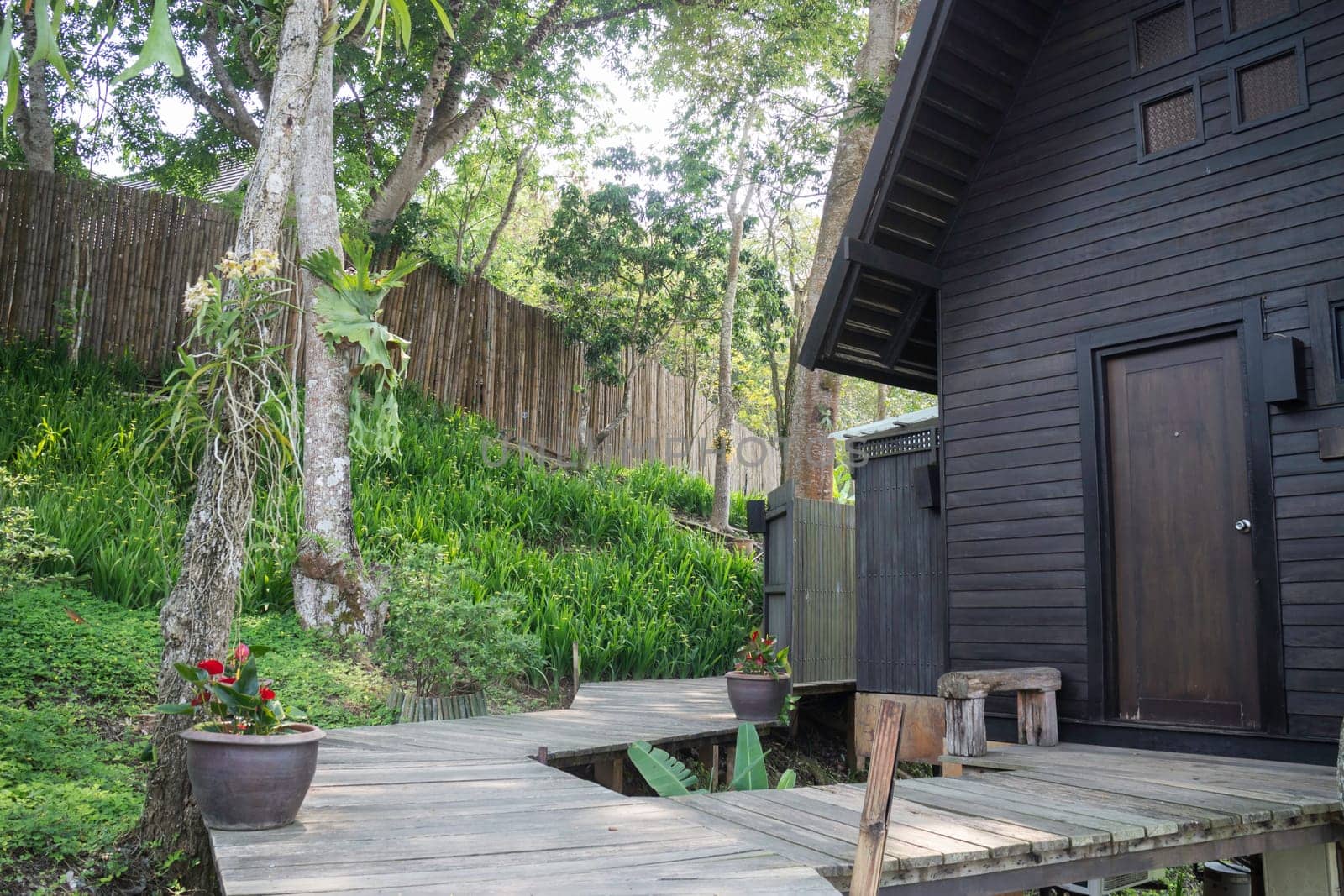 Wooden bangalow in hotel resort, stock photo