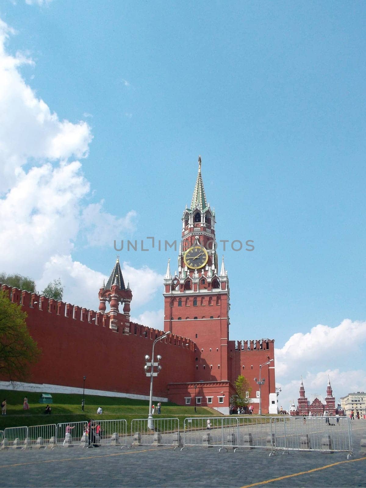 Spasskaya Tower of the Kremlin on Red Square against the blue sky. Moscow, Russia.