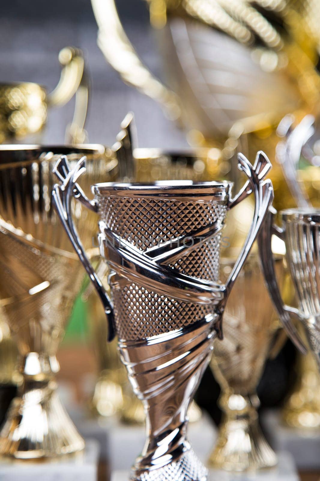 Award winning and championship concept, trophy cup on sport background