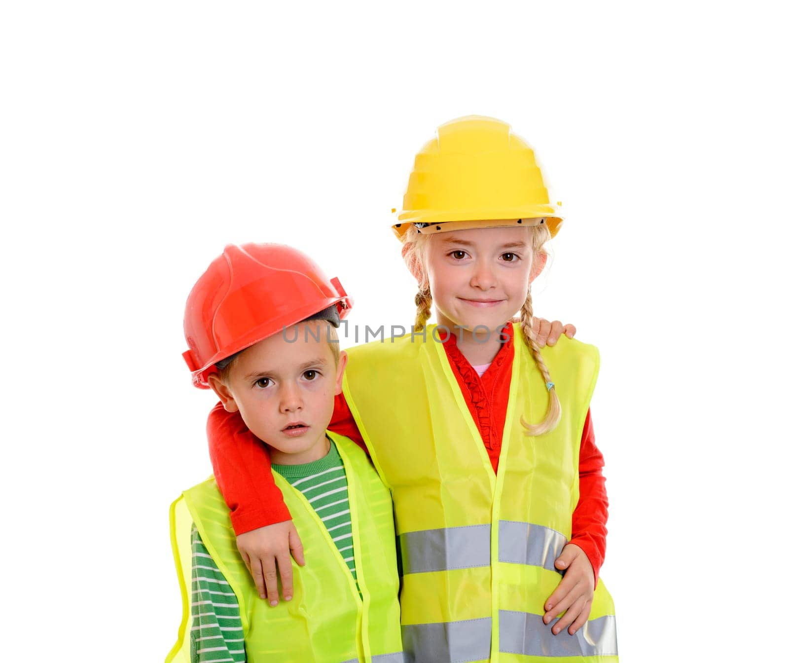 boy and girl with reflective vest and helmet in front of white background