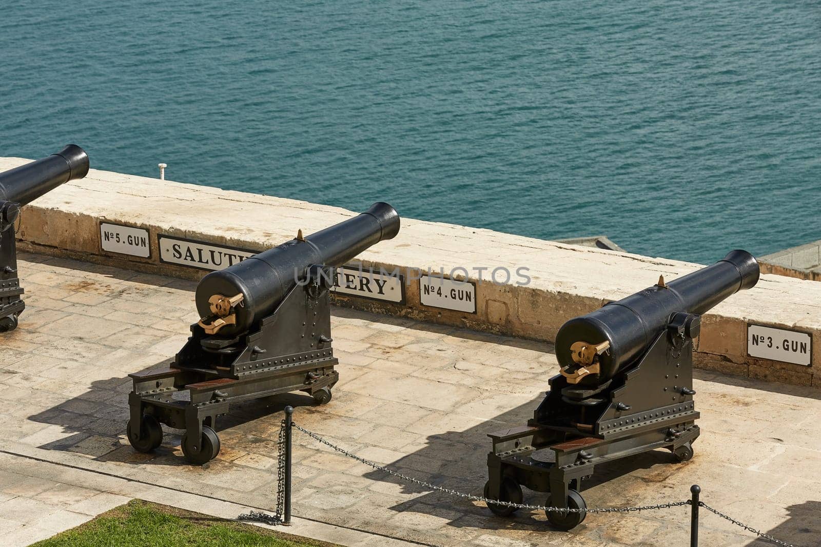 VALLETTA, MALTA - OCTOBER 30, 2017: Saluting battery and cannons in row at Upper Barrakka gardens in Valletta in Malta.