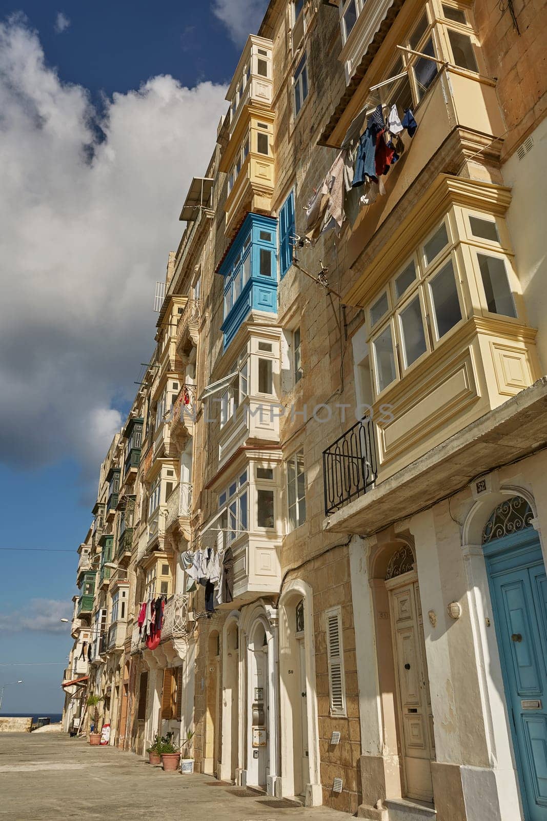 VALLETTA, MALTA - OCTOBER 30, 2017: Traditional colorful architecture and houses with balconies in Valletta in Malta.