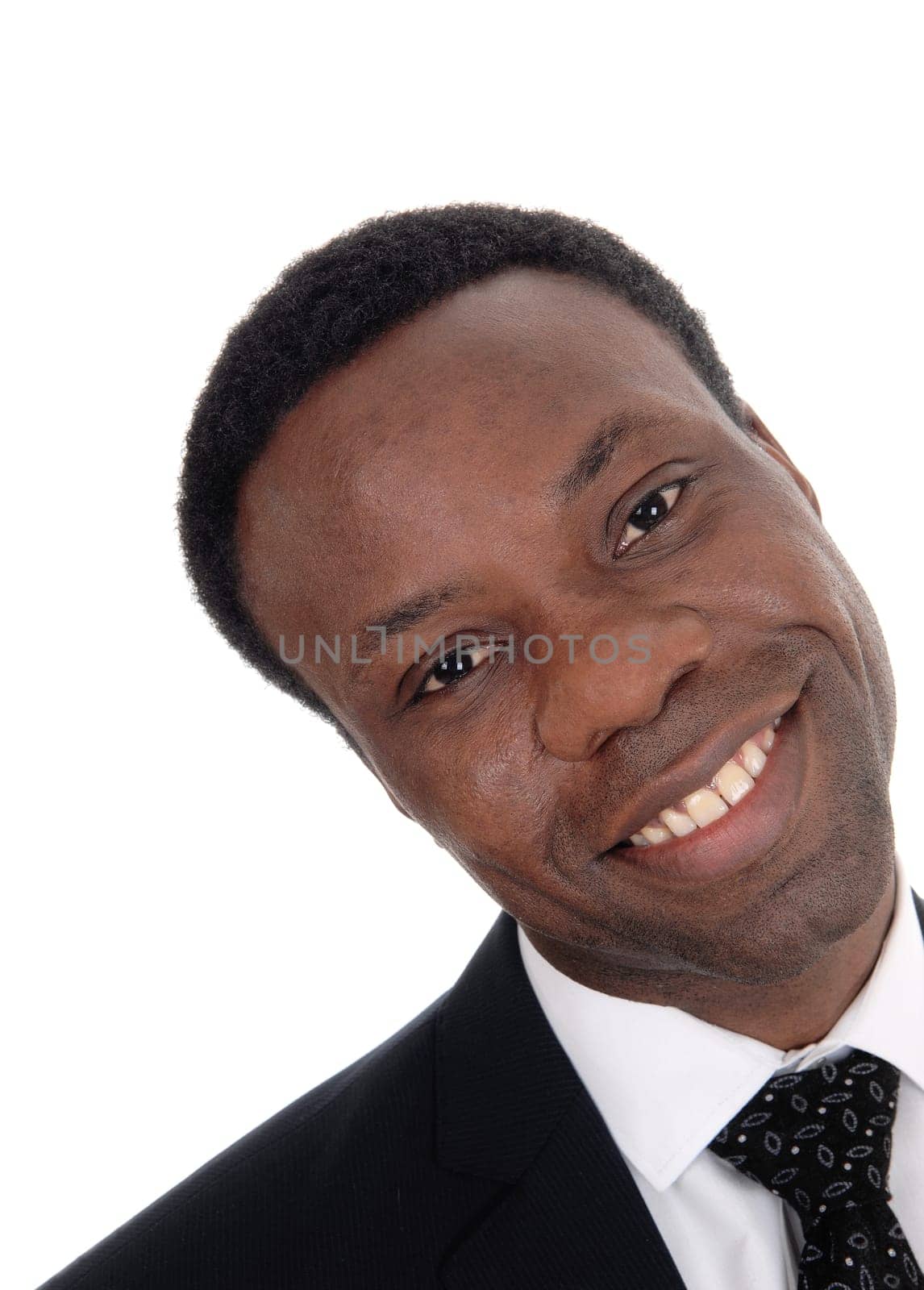 An image of a young African American man in a suit and tie, looking .into the camera with a positive look, isolated for white background.