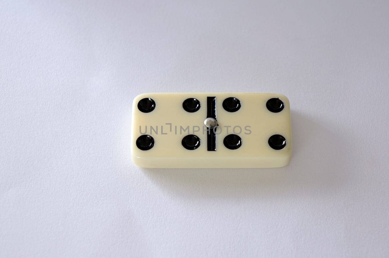 domino isolated white background four game piece