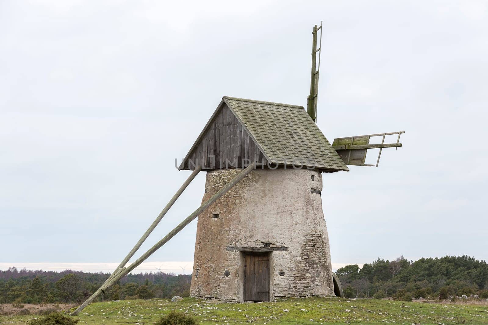 Windmill on Gotland, Sweden with a cloudy sky.