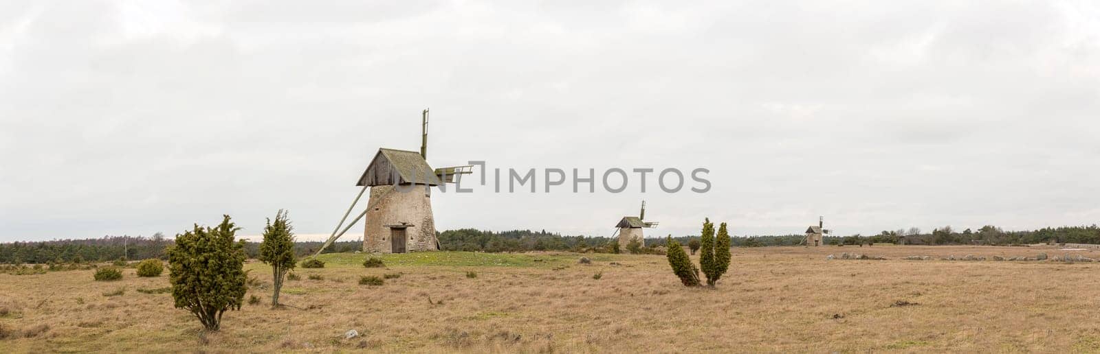 Windmill on Gotland, Sweden with a cloudy sky.