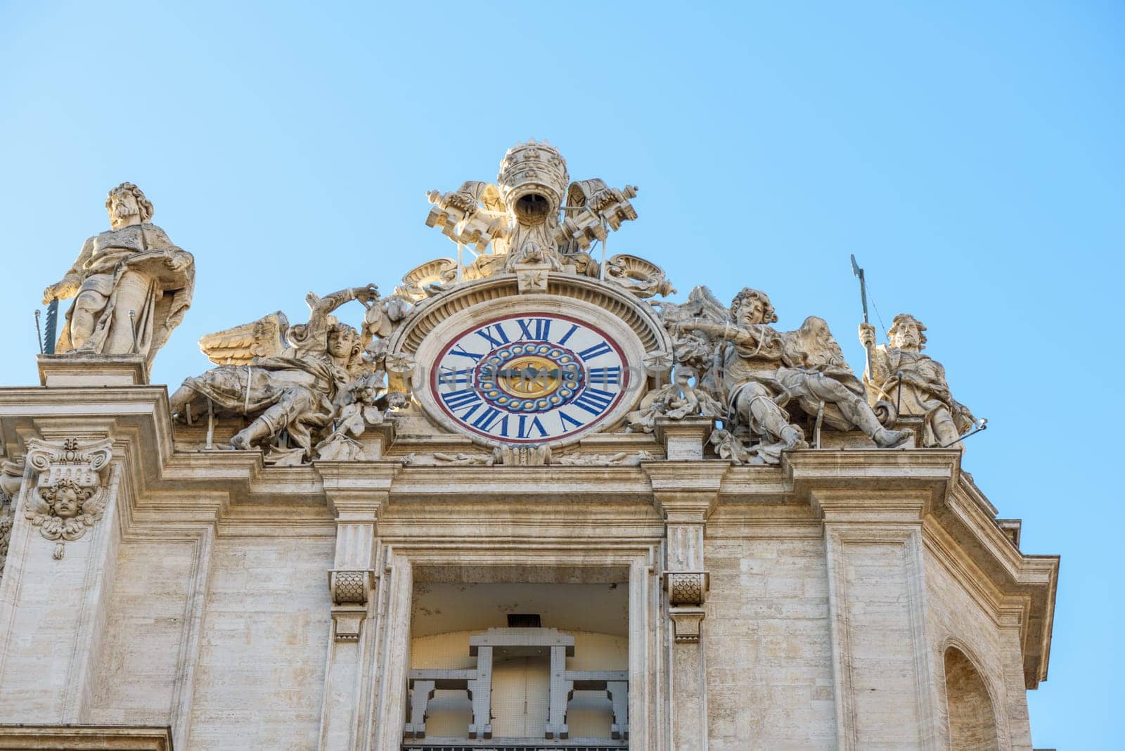 Rome, Italy - January 04, 2015: Particulars of Sain Peter cathedral the clock, Rome Italy