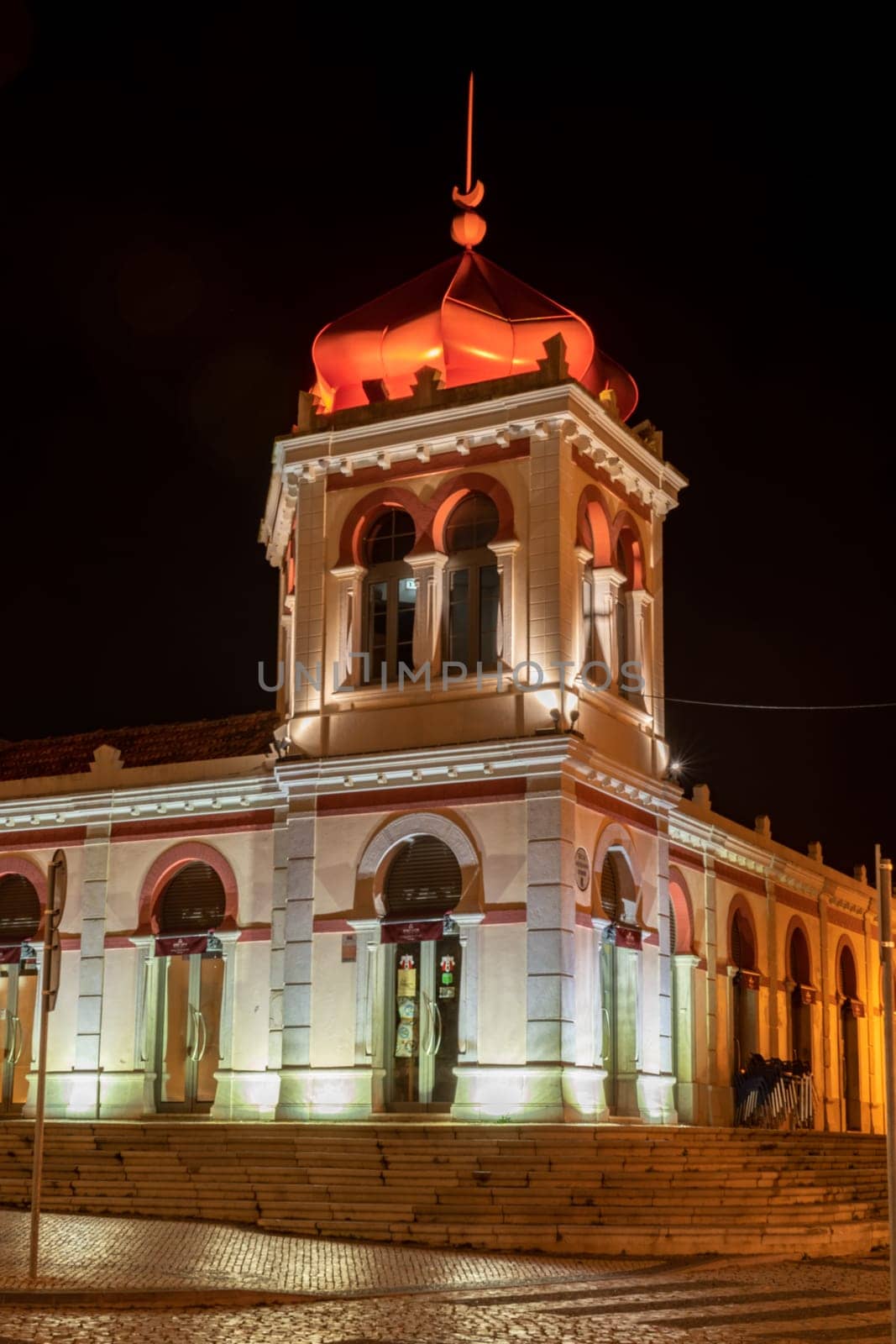 LOULE, PORTUGAL - CIRCA MAY 2018: The markethall in the old town of Loule at night. Algarve, Portugal.