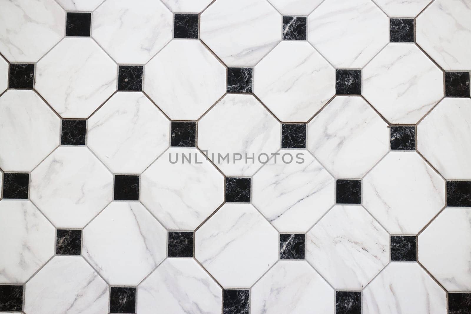 Black and white checkered marble floor, stock photo