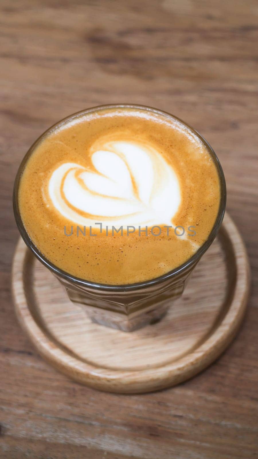 Cup of piccolo latte coffee with latte art, stock photo