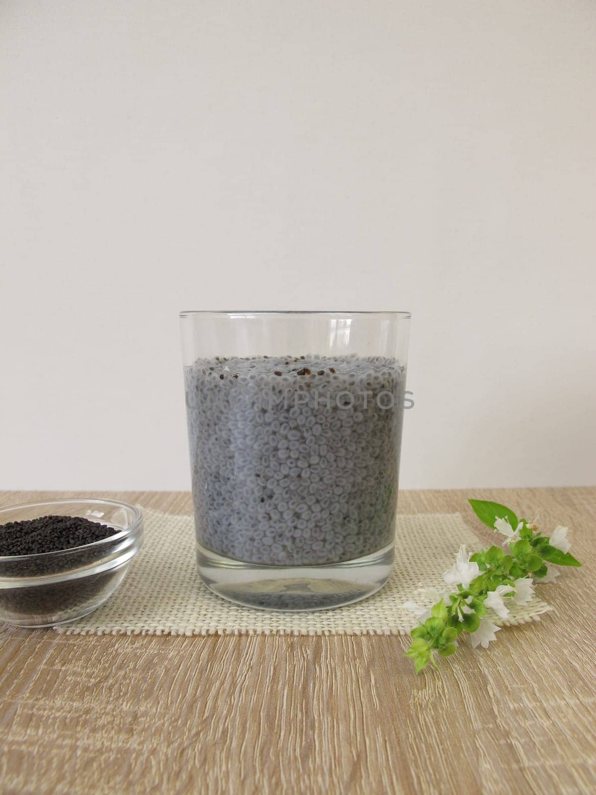 Gel drink in a glass from the swelled superfood basil seeds and water