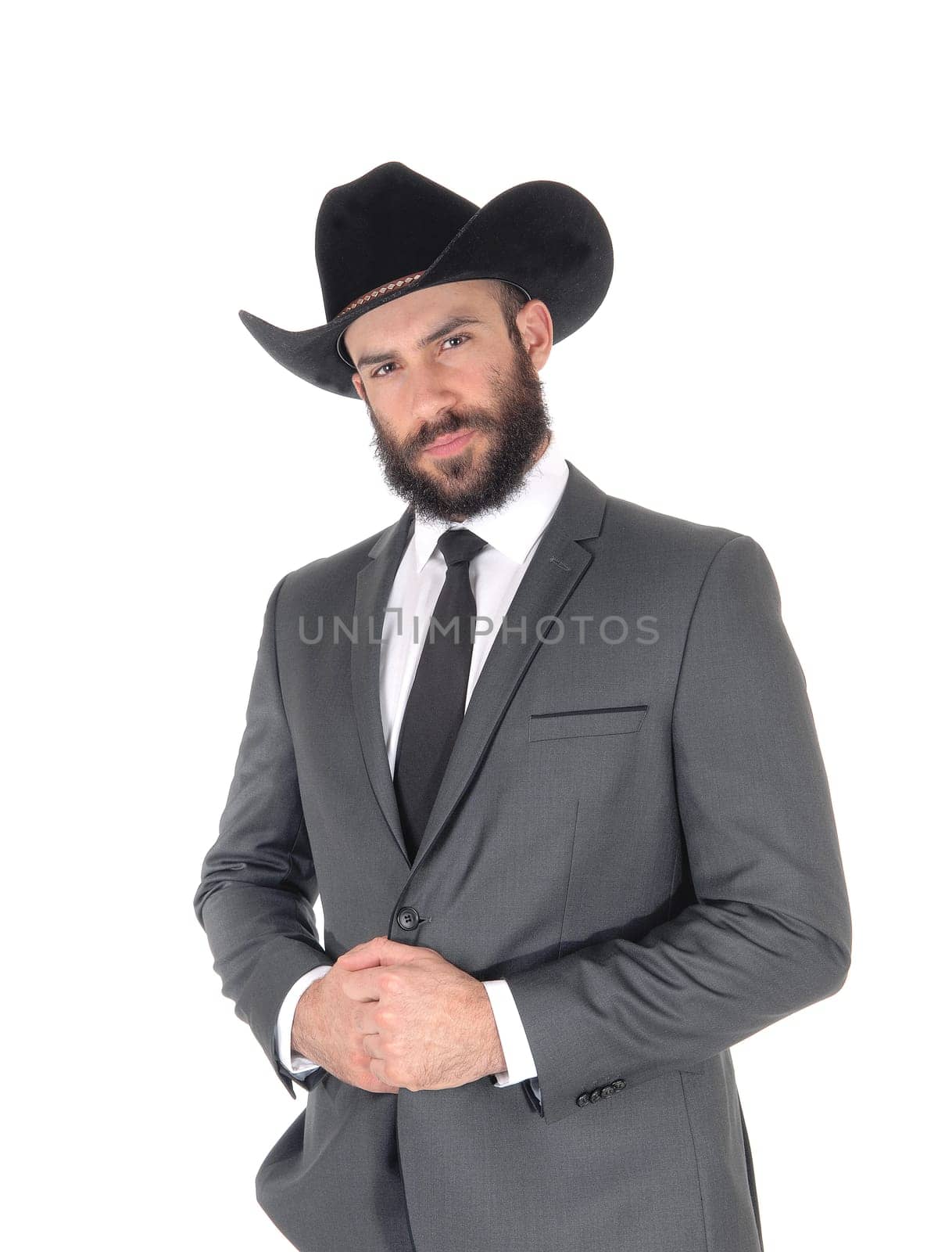 A close up portrait image of a handsome man in a suit and cowboy hat.with a beard and mustache, isolated for white background.