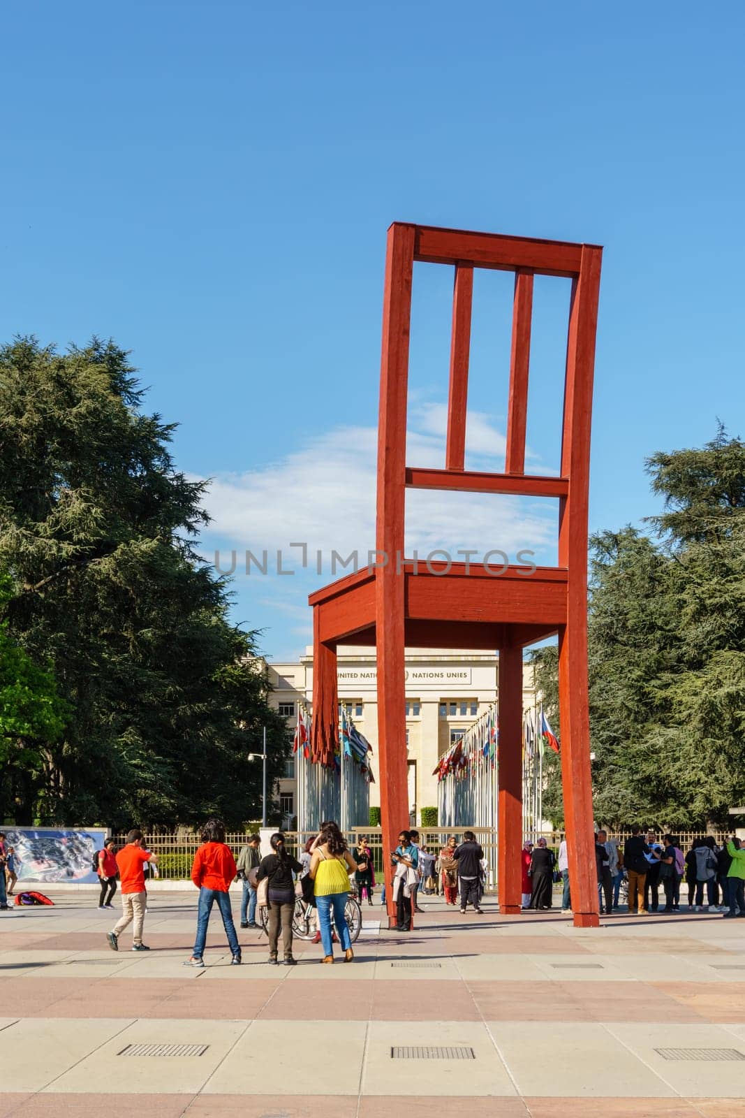 Geneva, Switzerland - April 04,2018: The Place of Nations,  gigantic 'Broken Chair', symbol of the fight against landmines at May 10, 2013 in Geneva, Switzerland. Around are the headquarters of about 250 international organizations. Artist Daniel Berset.