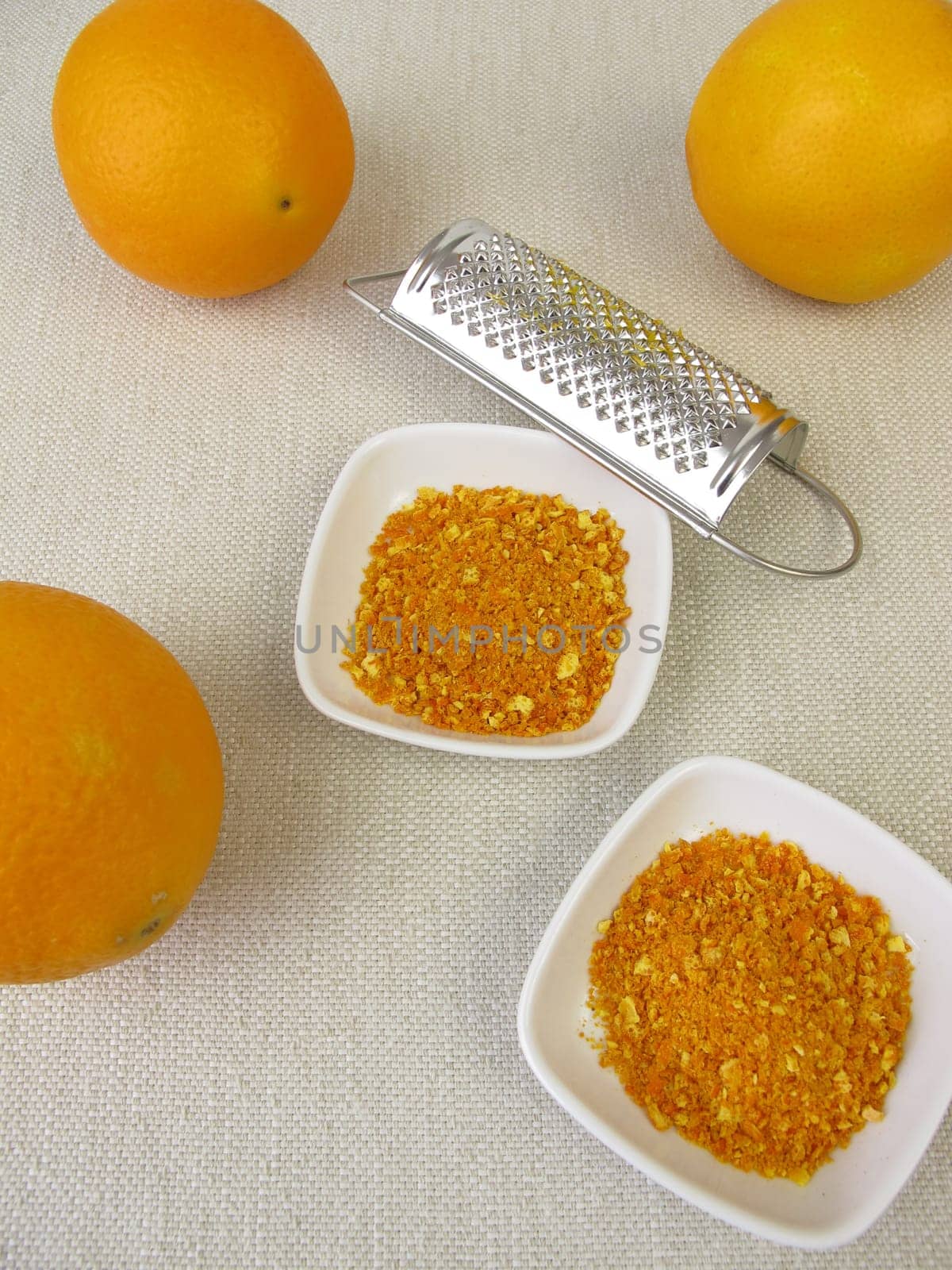 Orange abrasion of organic oranges and a grater