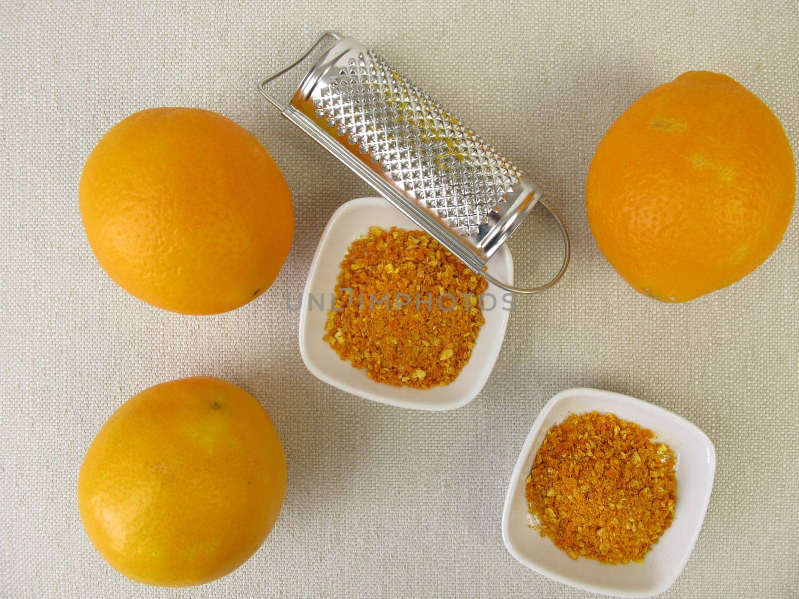Orange abrasion of organic oranges and a grater