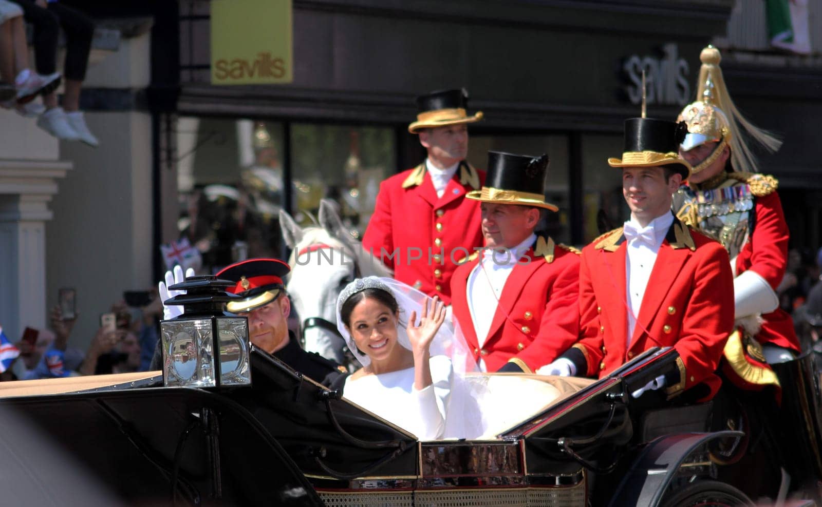 Prince Harry & Meghan Markle wedding, Windsor, Uk - 19/5/2018: Prince Harry and Meghan Markle wedding procession through streets of Windsor then back the Windsor Castle waving to crowd