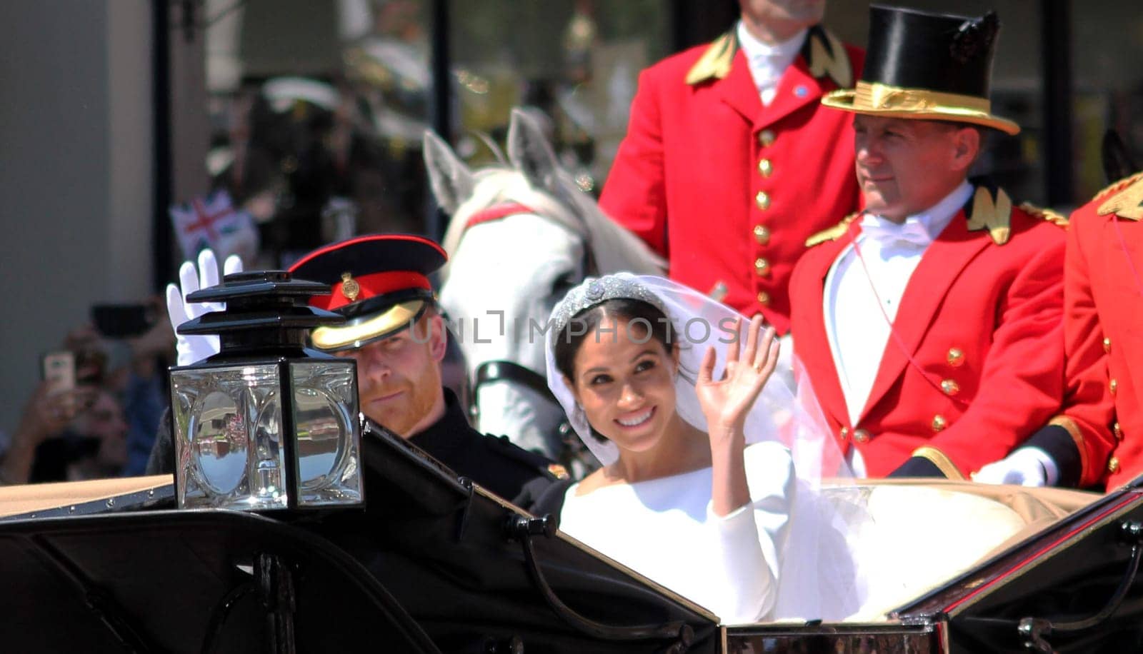 Prince Harry & Meghan Markle wedding, Windsor, Uk - 19/5/2018: Prince Harry and Meghan Markle wedding procession through streets of Windsor then back the Windsor Castle waving to crowd