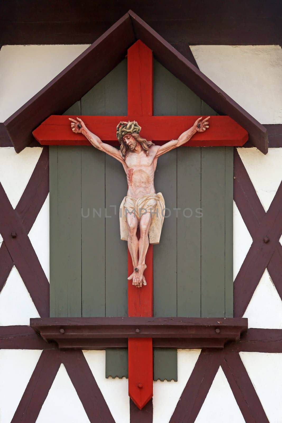 Crucifix on half-timbered structure in Endingen am Kaiserstuhl