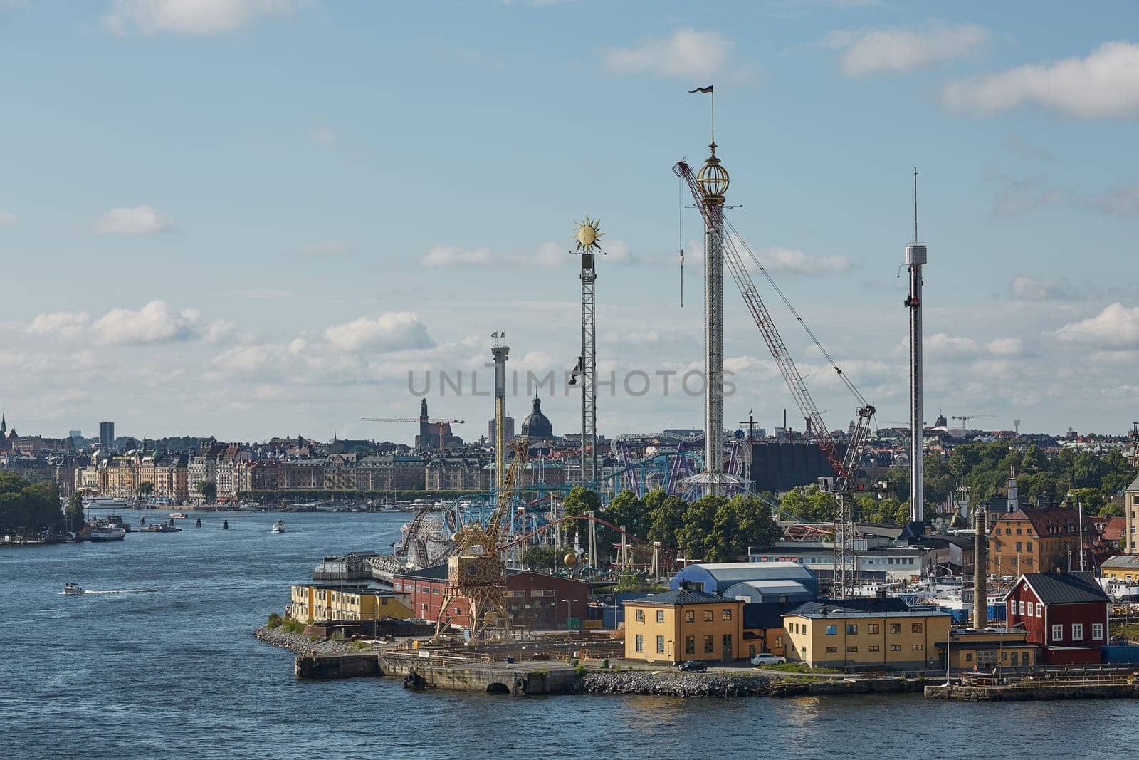 STOCKHOLM, SWEDEN - JULY 11, 2017: City landscape and Tivoli Grona Lund - Gronan - amusement park on the Djurgarden Island in Stockholm in Sweden