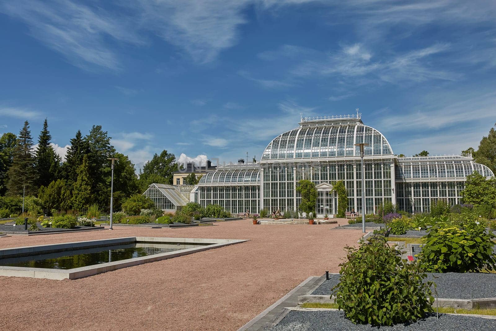 HELSINKI, FINLAND - JULY 10, 2017: Kaisaniemi botanic garden and its greenhouse in Helsinki Finland.