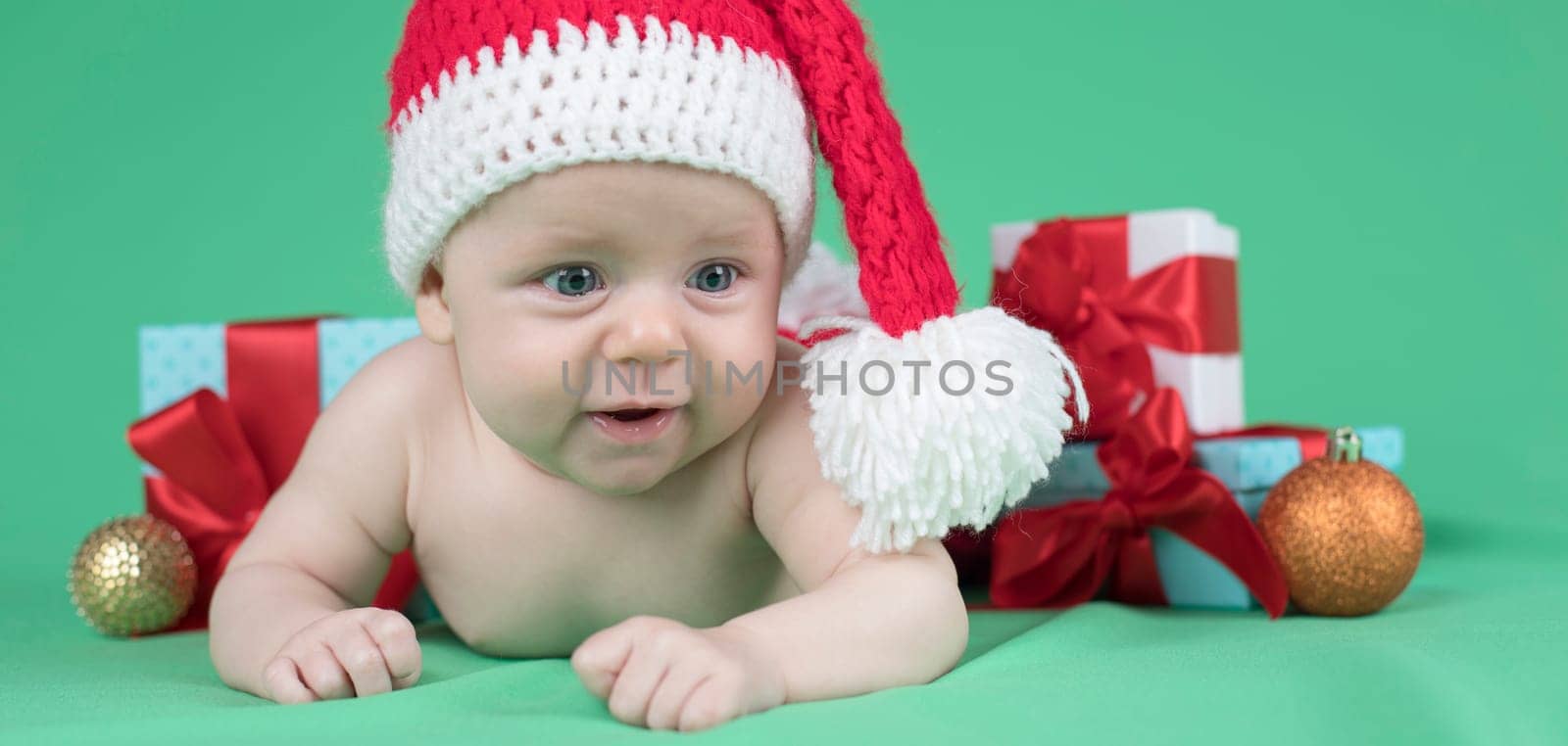 Little cute baby girl with santa hat