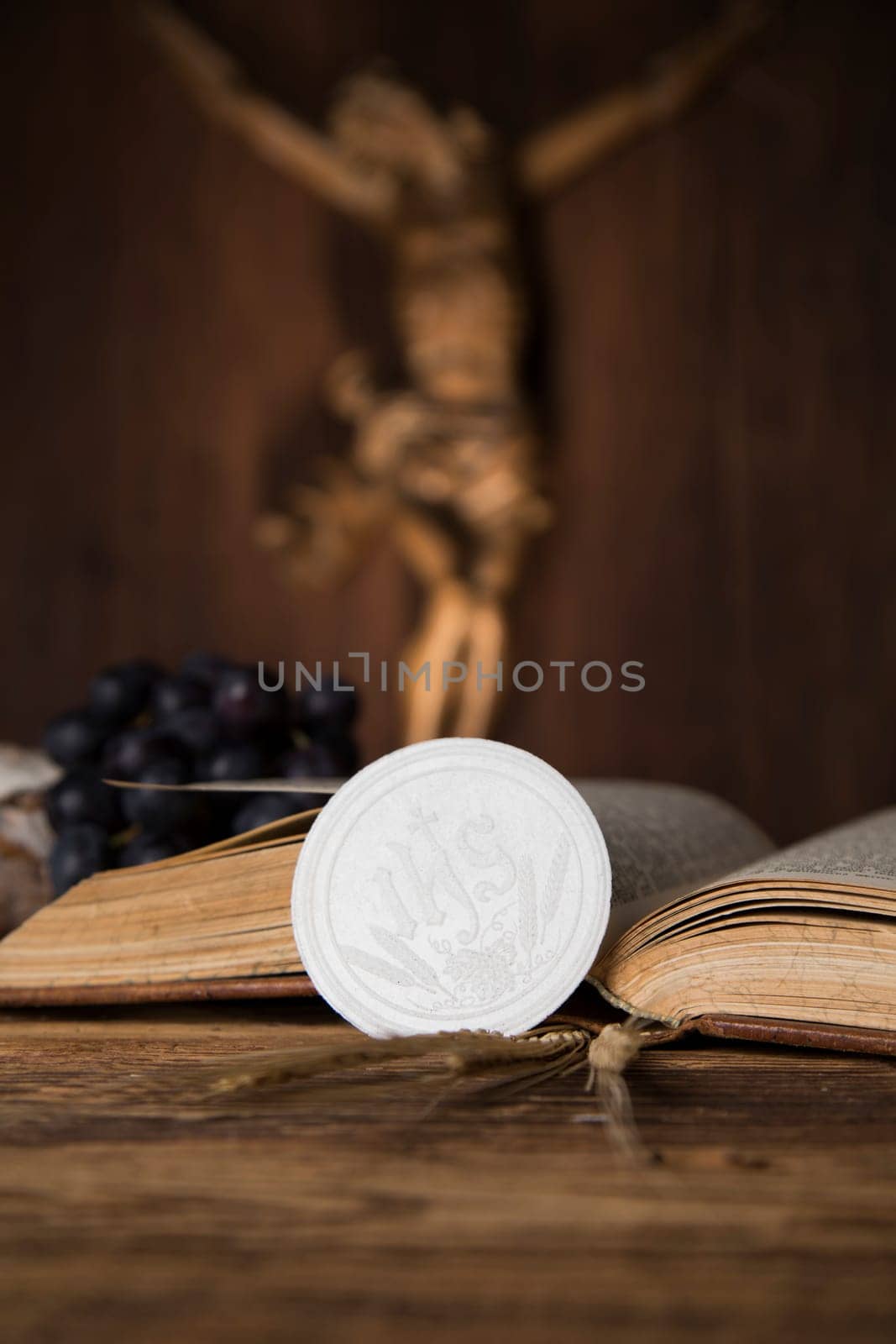 Eucharist symbol of bread and wine, chalice and host, First communion background