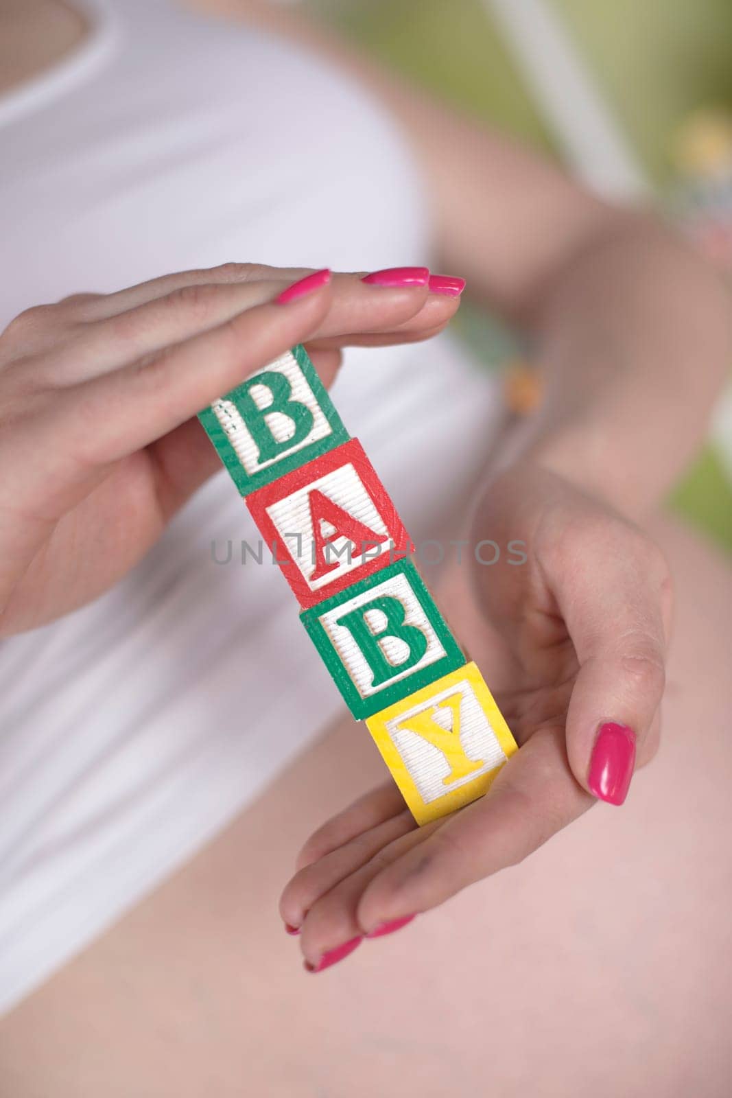 Wooden toy cubes with letters, Baby, Pregnancy concept