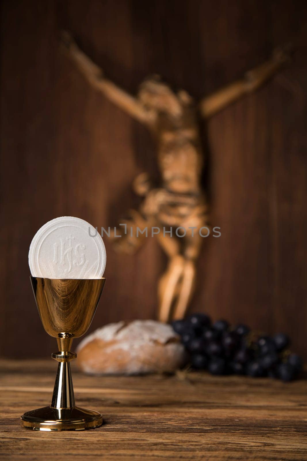 Eucharist symbol of bread and wine, chalice and host, First communion background