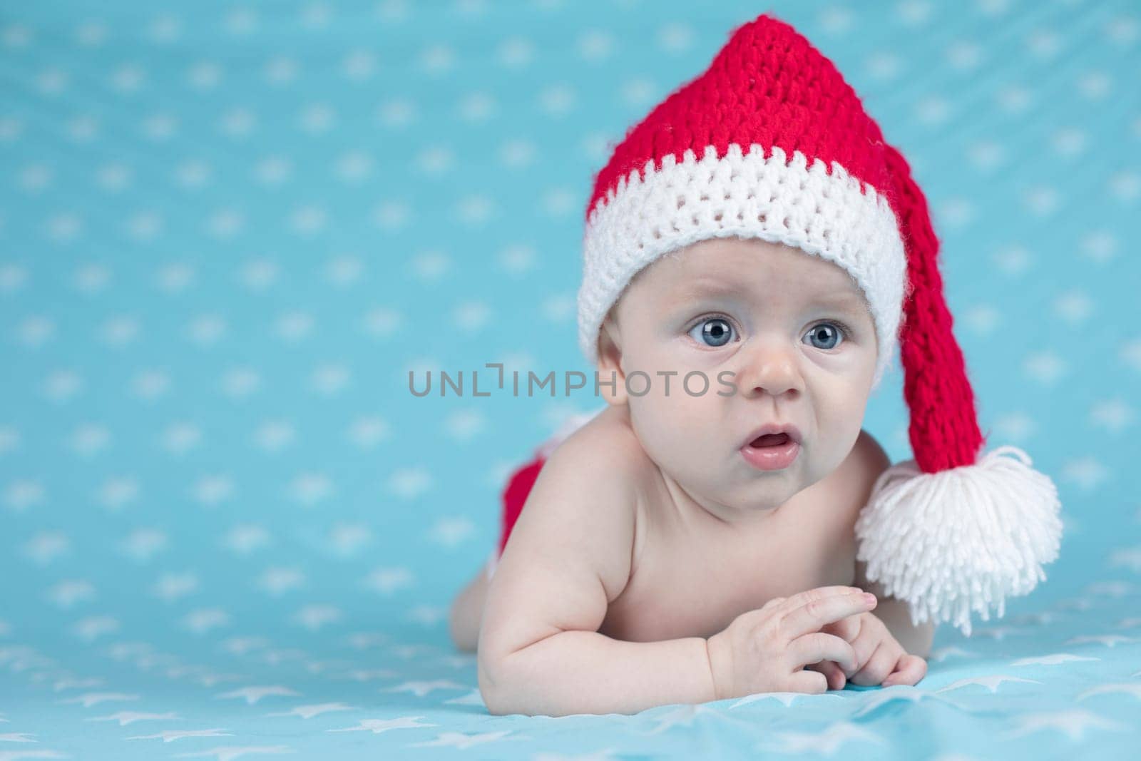 Little cute baby girl with santa hat