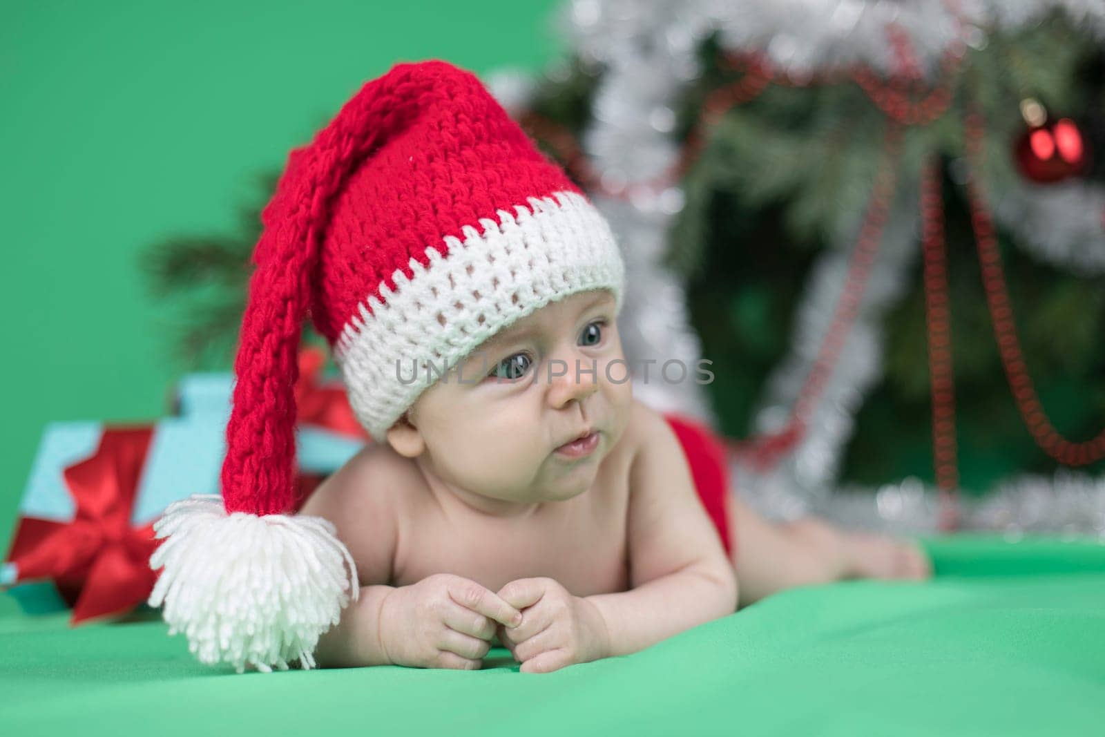 Little cute baby girl with santa hat