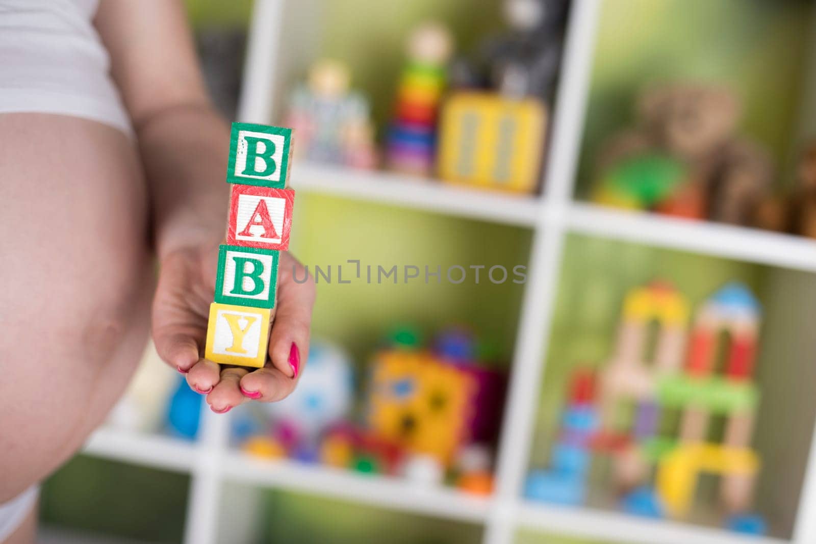 Wooden toy cubes with letters, Baby, Pregnancy concept