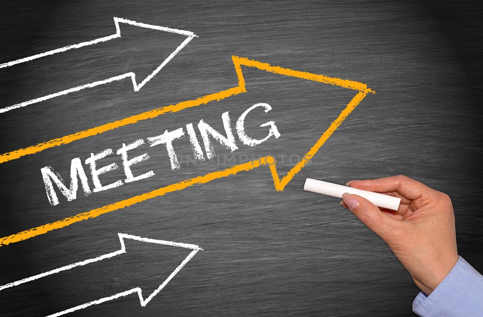 Meeting - Chalk board with arrows and hand