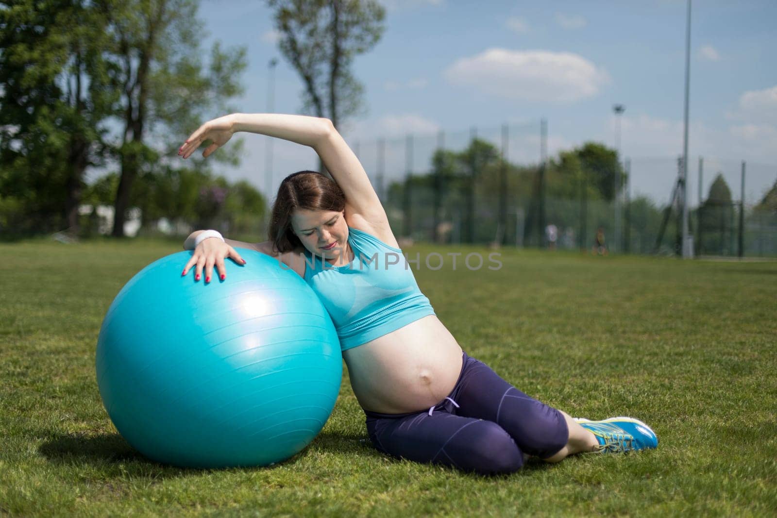 Pregnancy, sport, fitness, people and healthy lifestyle concept