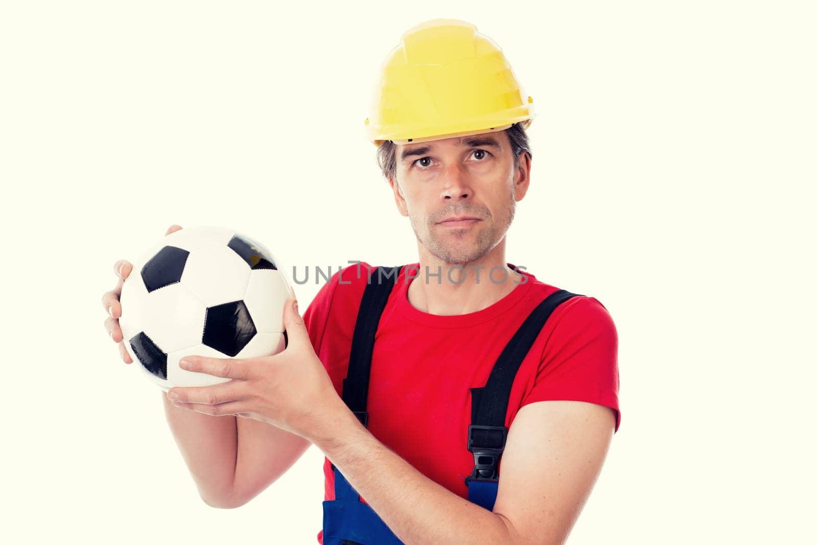handcrafter with helmet  and soccer ball