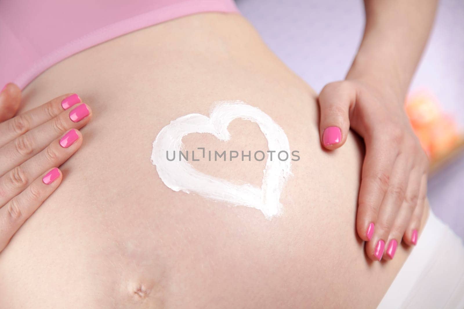Pregnant woman loving her baby